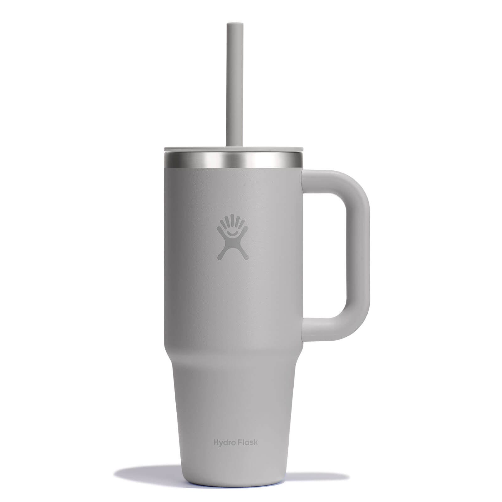 Hydro Flask Tumbler and Kids bottle lined up on a kitchen counter